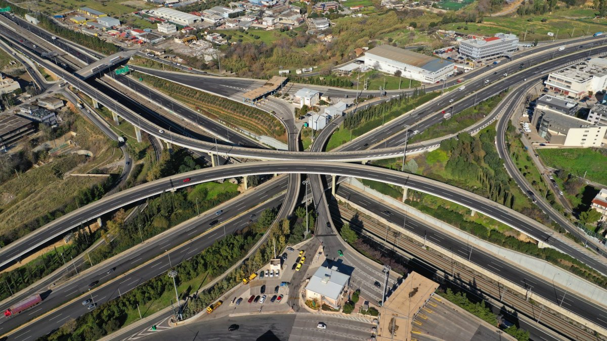 Aerial drone photo of multilevel junction national road crossing urban Metropolitan area